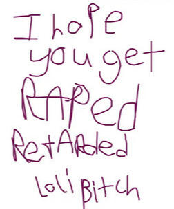 An image with writing saying "I hope you get raped, retarded loli bitch".